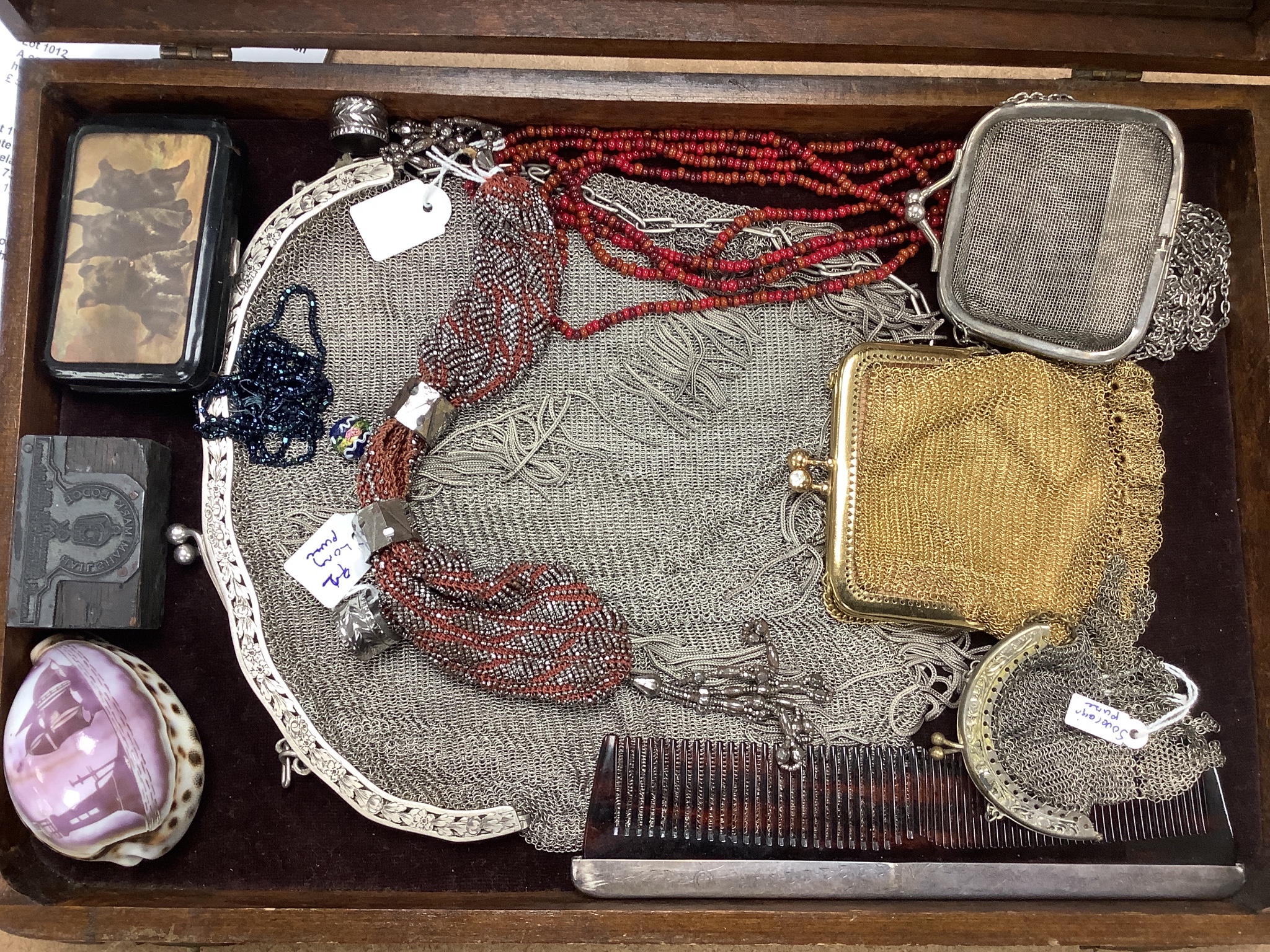 A collection of approximately fifty Victorian and later beadwork, white metal and fabric purses etc.